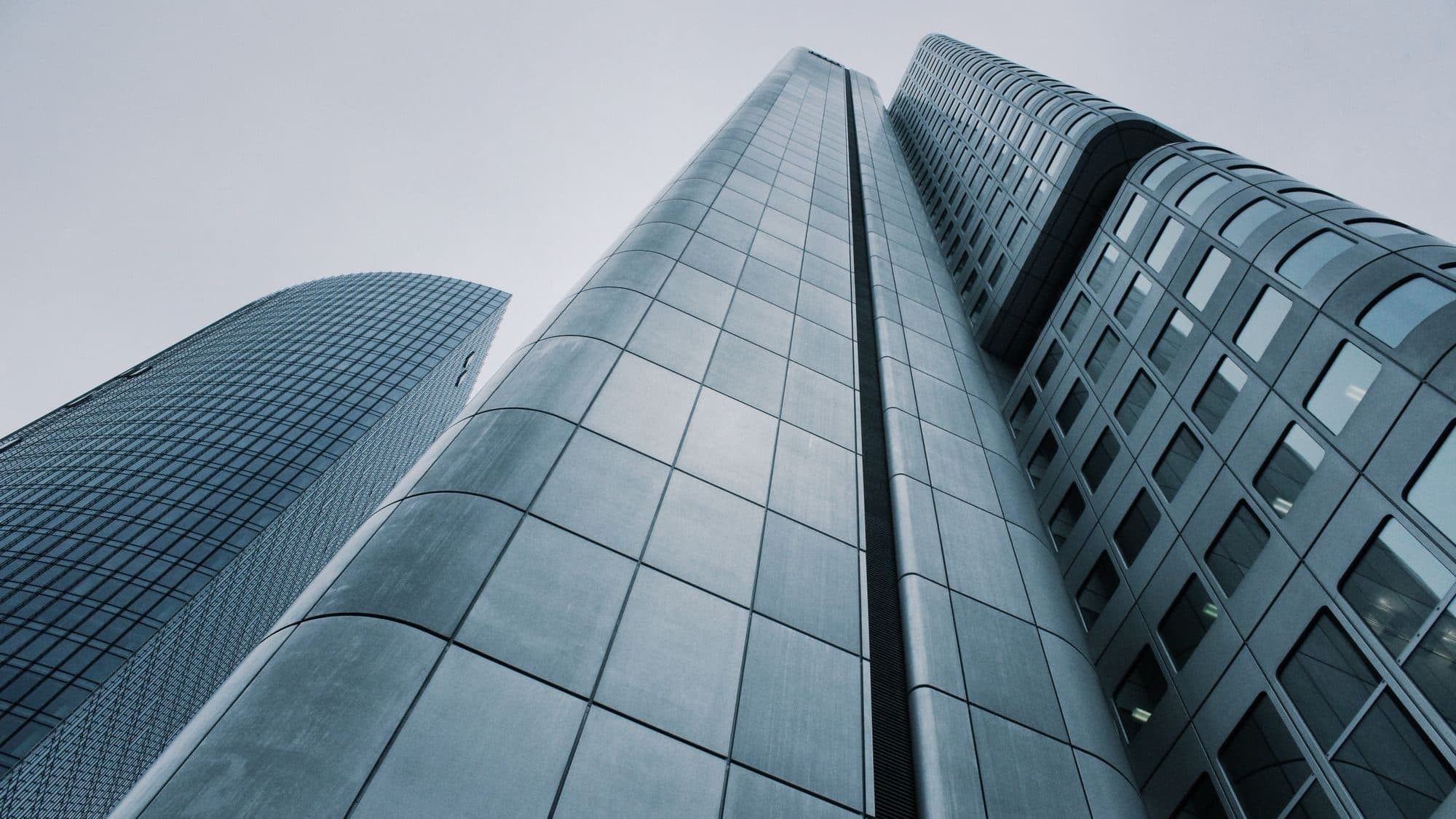 Glass office towers seen from the street