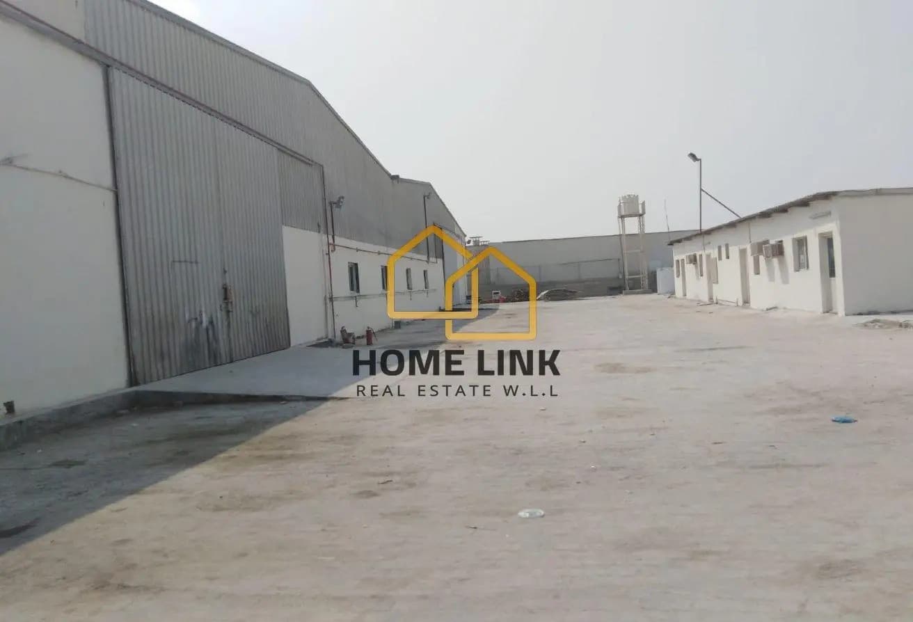 BIG STORE WITH WORKERS HOUSING IN INDUSTRIAL AREA